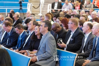 Audience enjoying a moment of levity during a keynote speech at a conference in Aspen, CO.