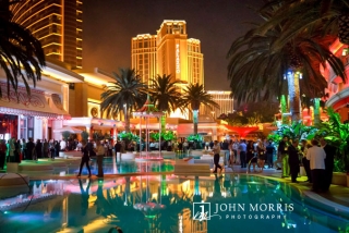 Large convention crowd enjoying poolside networking party at the Encore Beach club in Las Vegas