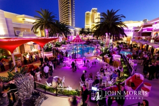 Wide view of outdoor networking party at the Encore Beach Club