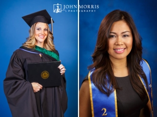 Two graduates pose for the camera in a formal portrait setting.