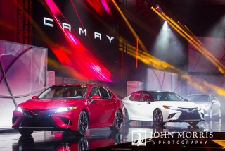 Elaborate stage presentation with three full size cars revealed to an audience of business owners at a general session during a corporate event at the Mandalay Bay Convention Center in Las Vegas
