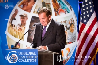 Homeland Security Chief Tom Ridge, speaks from behind a podium during a conference on Global leadership in San Diego
