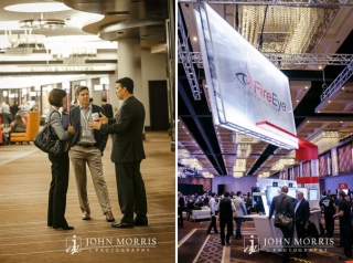 Attendees in Business attire networking in a commons area and spending time at a trade show booth.