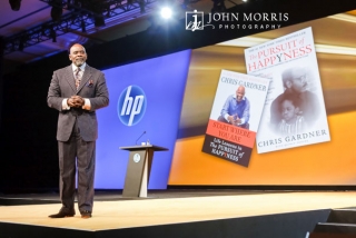 Chris Gardner, author of the book, "The Pursuit of Happiness", gives a keynote speech during a conference.