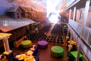 An indoor dance hall is converted to a amazing corporate event space in preparation for a conference.