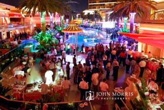 Large crowd of attendees enjoying an after hours networking party at the Encore Beach Club in Las Vegas