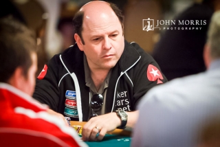 Jason Alexander staring intently at poker table during play at the World Series of Poker in Las Vegas