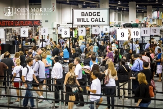 Long lines indicated a popular trade show as attendees wait patiently to receive their badges during a trade show.