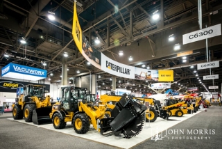 Massive exhibit for Caterpillar construction vehicles inside an exhibit hall for a trade show in Las Vegas.