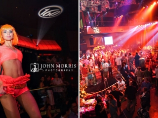 Dancers perform while attendees enjoy a corporate networking event with a nightclub vibe.