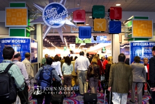 Eager attendees stream into the opening of the exhibit hall during The Travel Goods Show in Las Vegas.